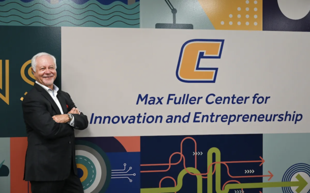 Max Fuller, a 1975 UTC graduate and co-founder of U.S. Xpress, Inc., stands in the center now bearing his name following a $5 million gift to UTC.